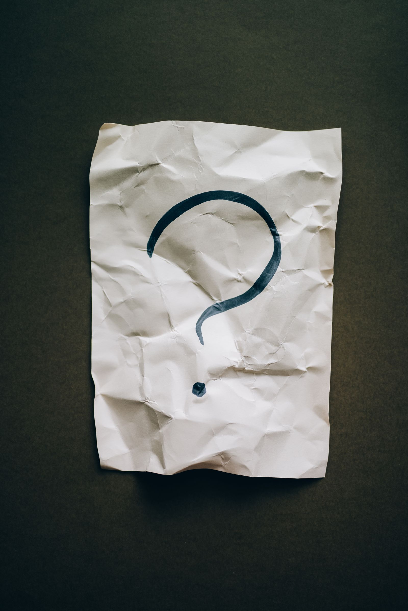 Large question mark on paper, representing common myths and misconceptions about Ayurveda