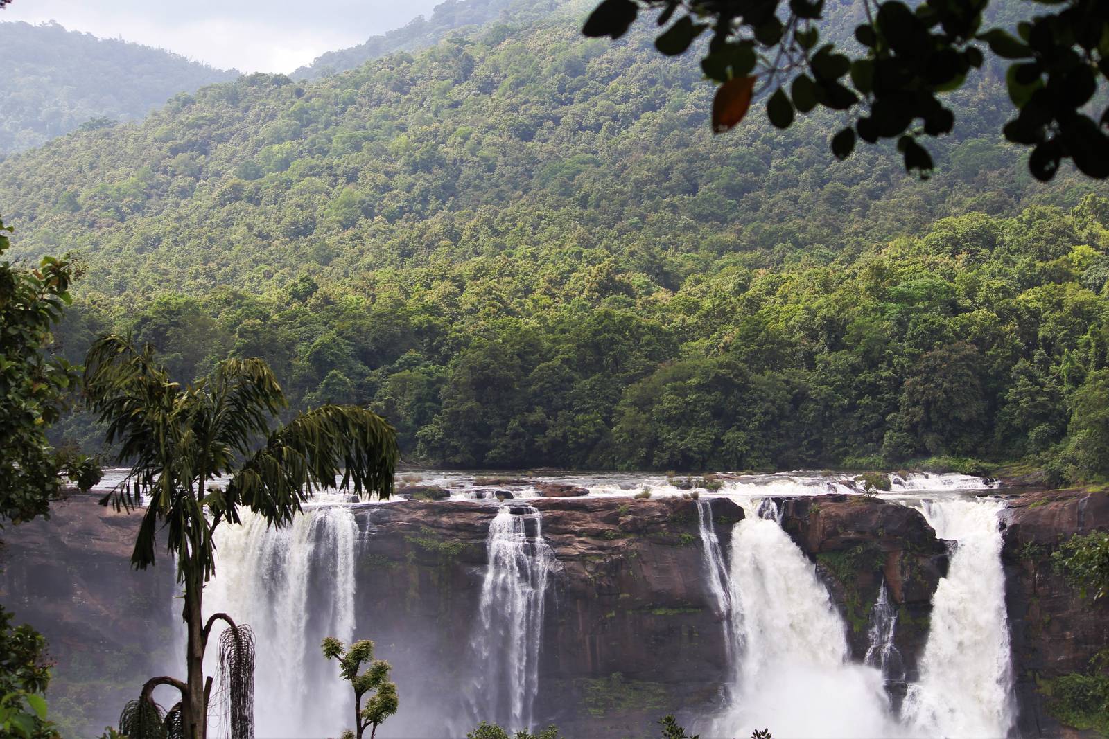 Athirappilly waterfall in Kerala's rainforest, a popular rest-day destination near Ayurveda treatment centres