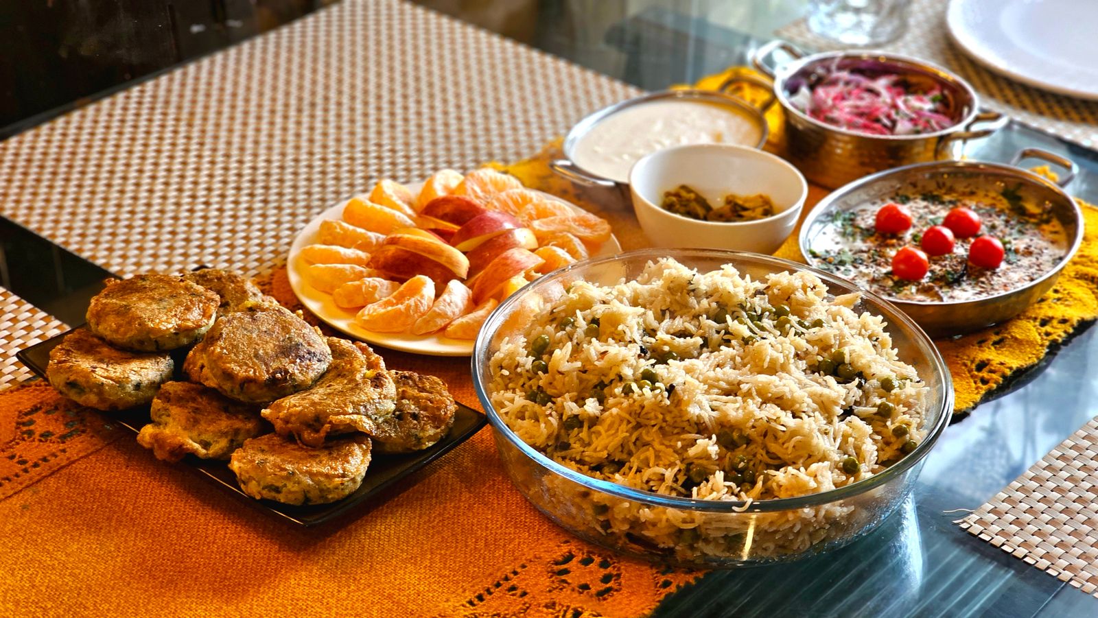 Vibrant Indian meal with rice and various dishes, representing Ayurvedic dietary principles